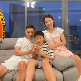 A Curious Tails customer with their new puppy in Singapore